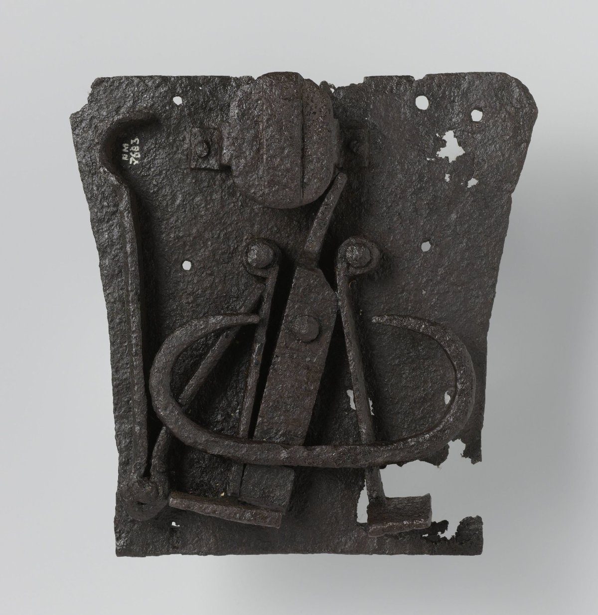 Internal mechanism of a lock, with part of a rusted-fast key