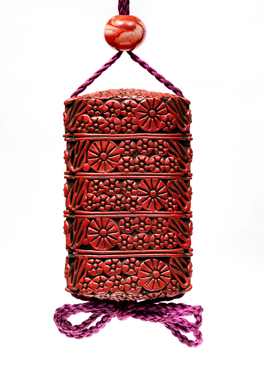 Inro with blossoms in red lacquer