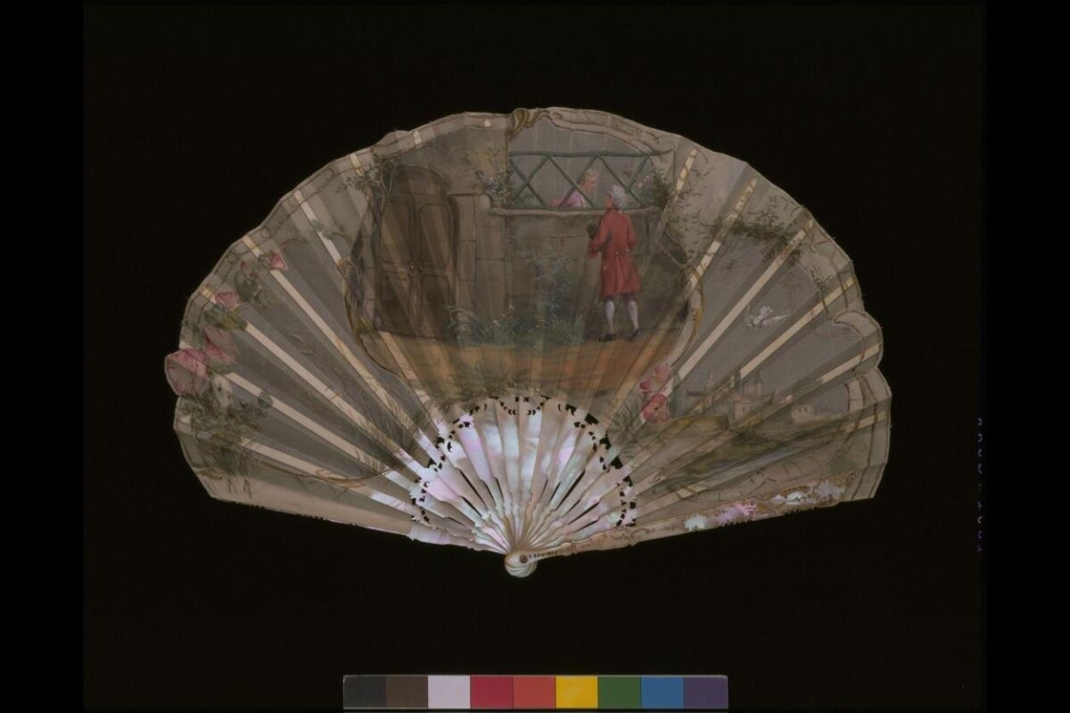 Fan of silk with applied mother of pearl, made in France, ca. 1900
