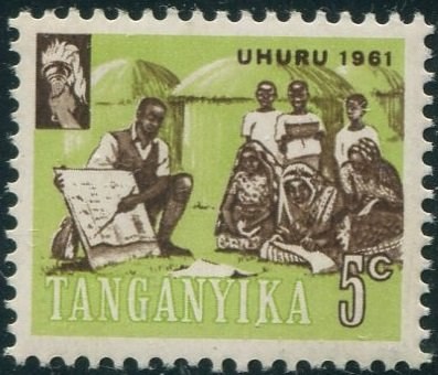 Photograph of a stamp from this issue (Wikimedia Commons file “Stamp of Tanganyika - 1961 - Colnect 315192 - TeacherVillagers.jpeg”). The paper, perforation or watermark variety shown cannot be confirmed from the photograph.