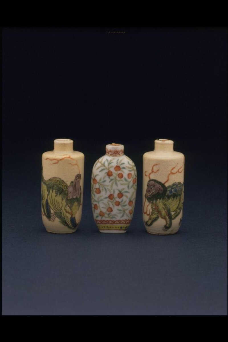 Chinese snuff bottle, 1850-1911, Qing dynasty; porcelain, with painted decoration depicting a fire-breathing mythical beast
