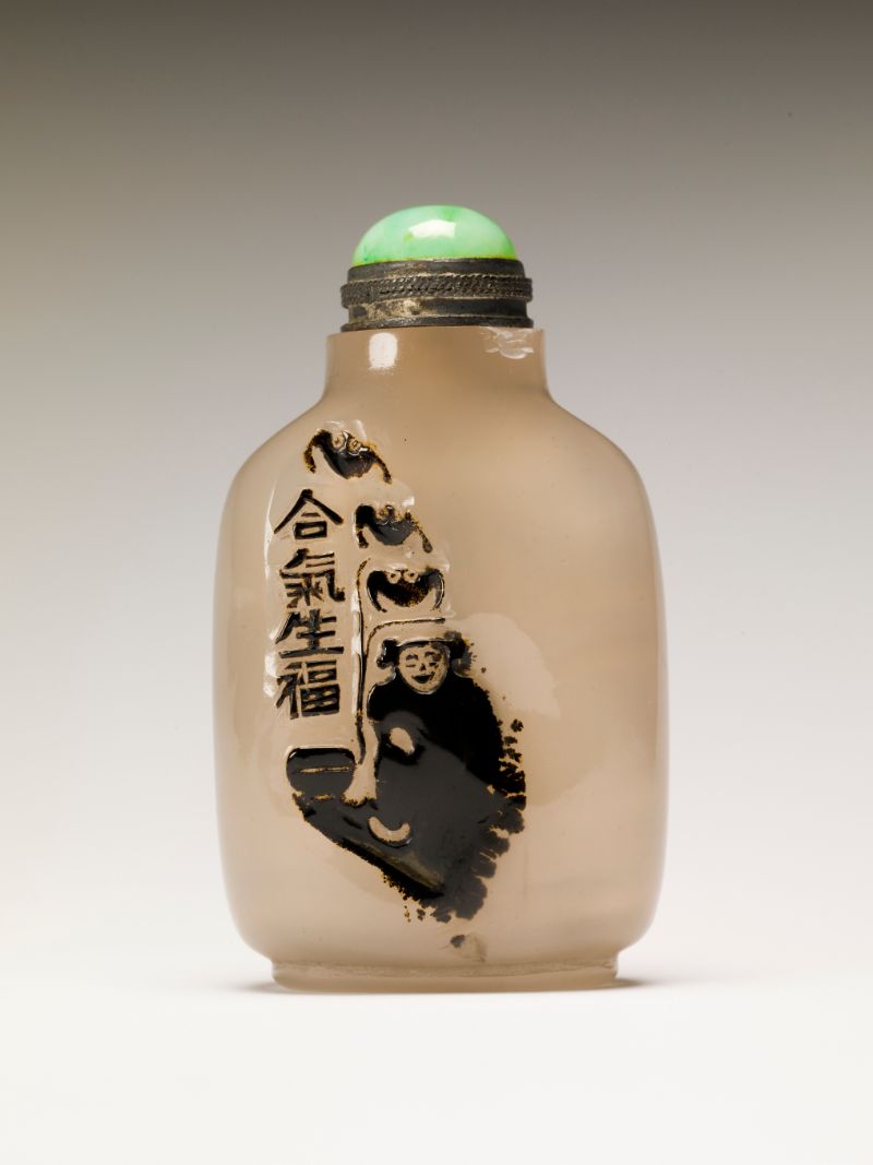 Snuff bottle carved with one of the immortals of harmony and union, Unknown