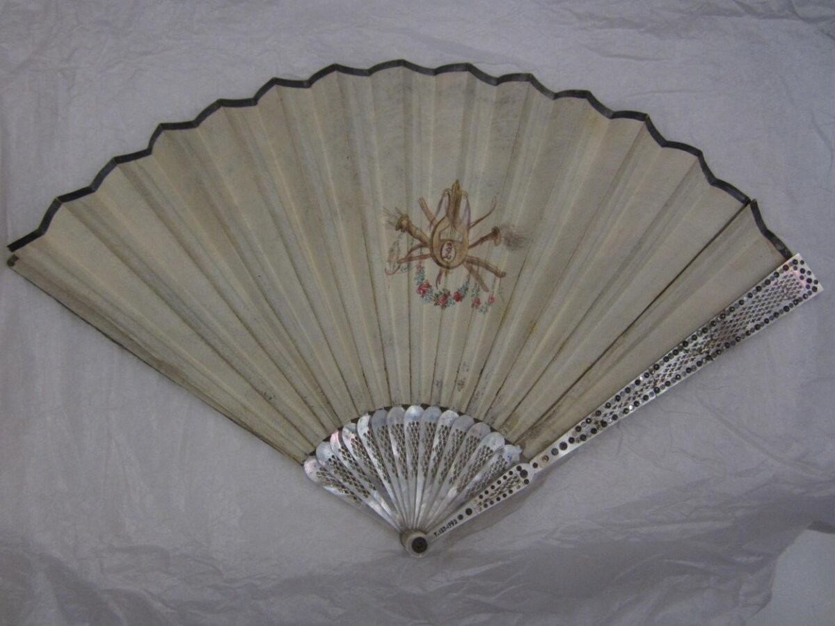 Leather fan with mother-of-pearl sticks, probably made in Italy, 1790s to 1815