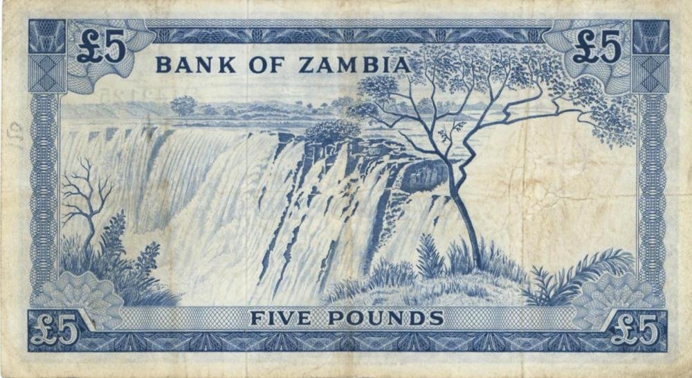 Auction photograph of an example of Pick 3 (Foreign Banknotes - ZAMBIA 5 Pounds 1964 - Pick #3...)