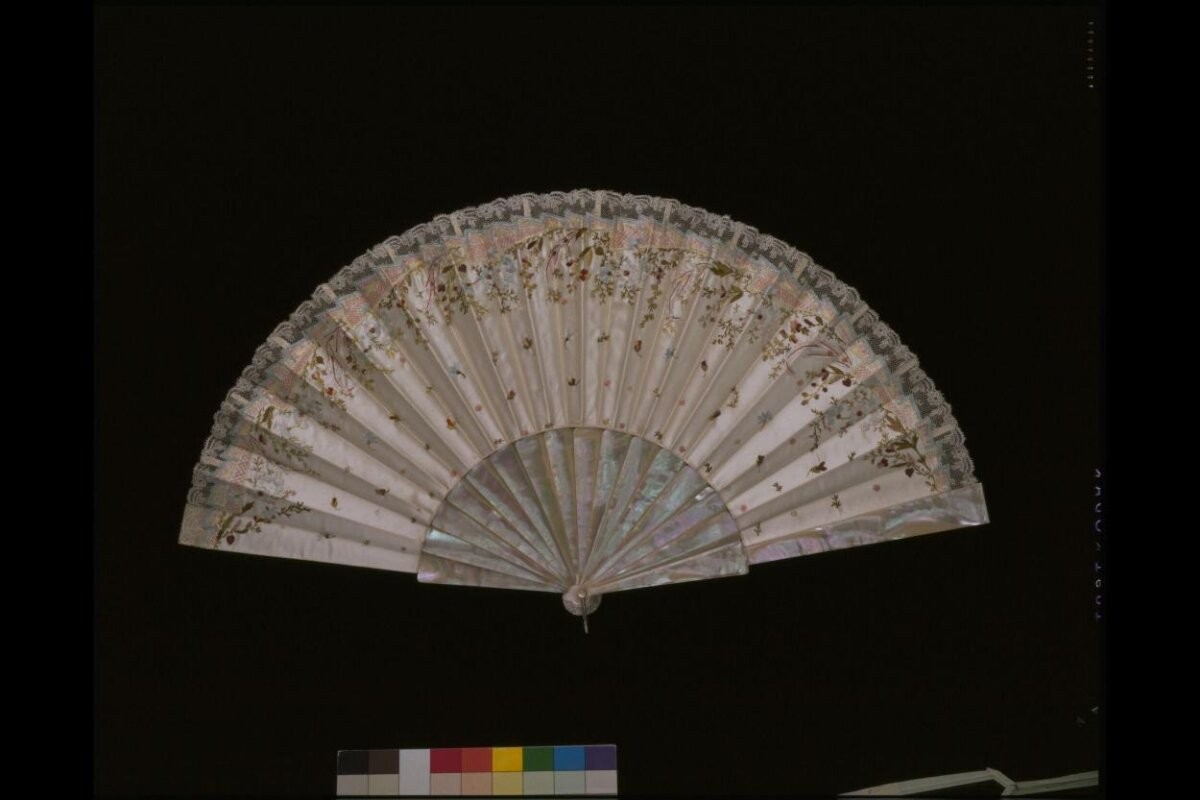 Fan of machine-embroidered satin in silks with mother-of-pearl sticks, Great Britain, 1880-1890