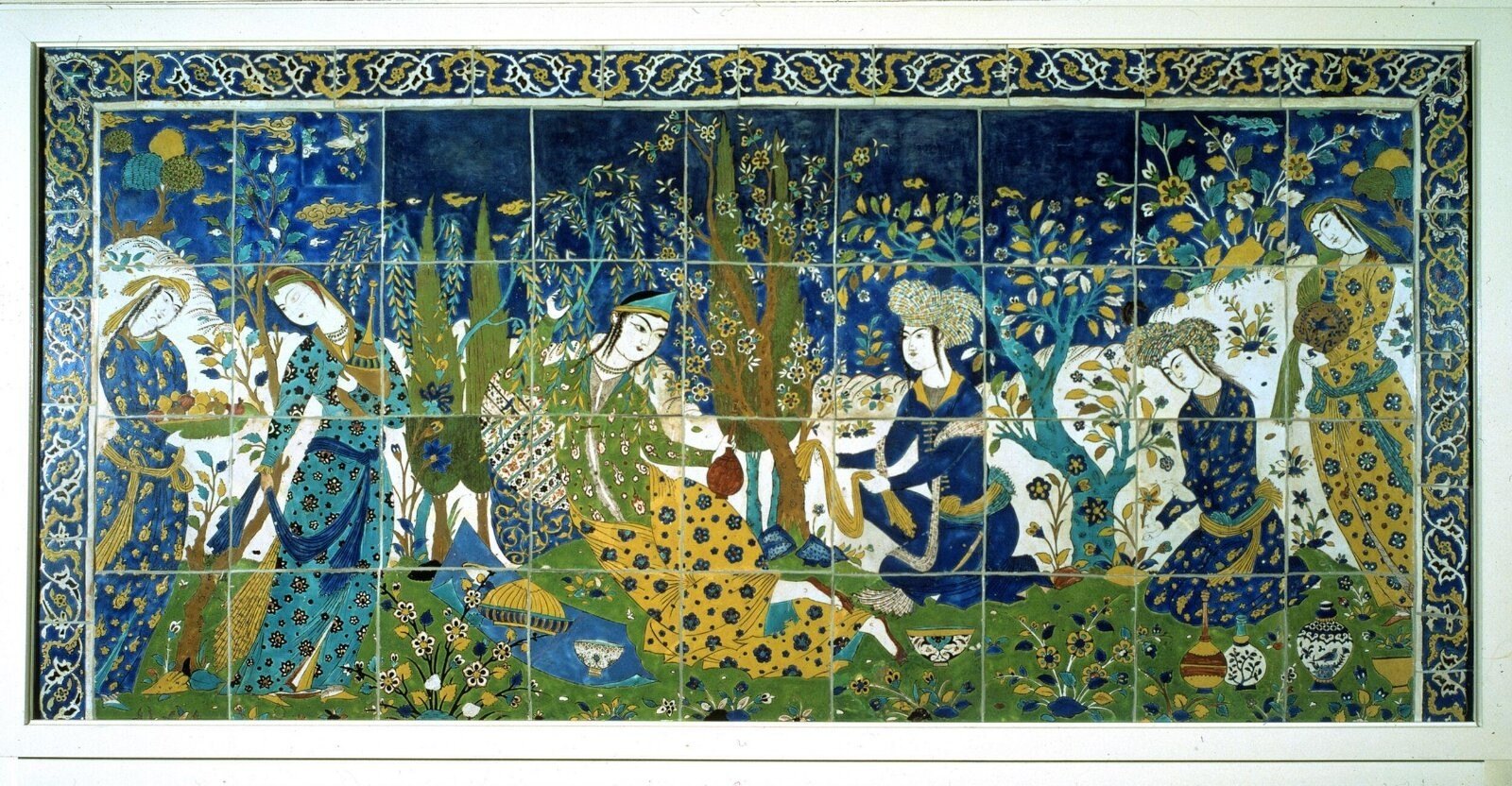 Tile panel, fritware picnic scene, Isfahan, 17th century — museum object 139:1 to 4-1891