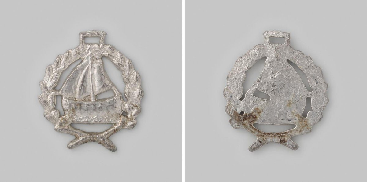 Badge of a fishing boat in a wreath