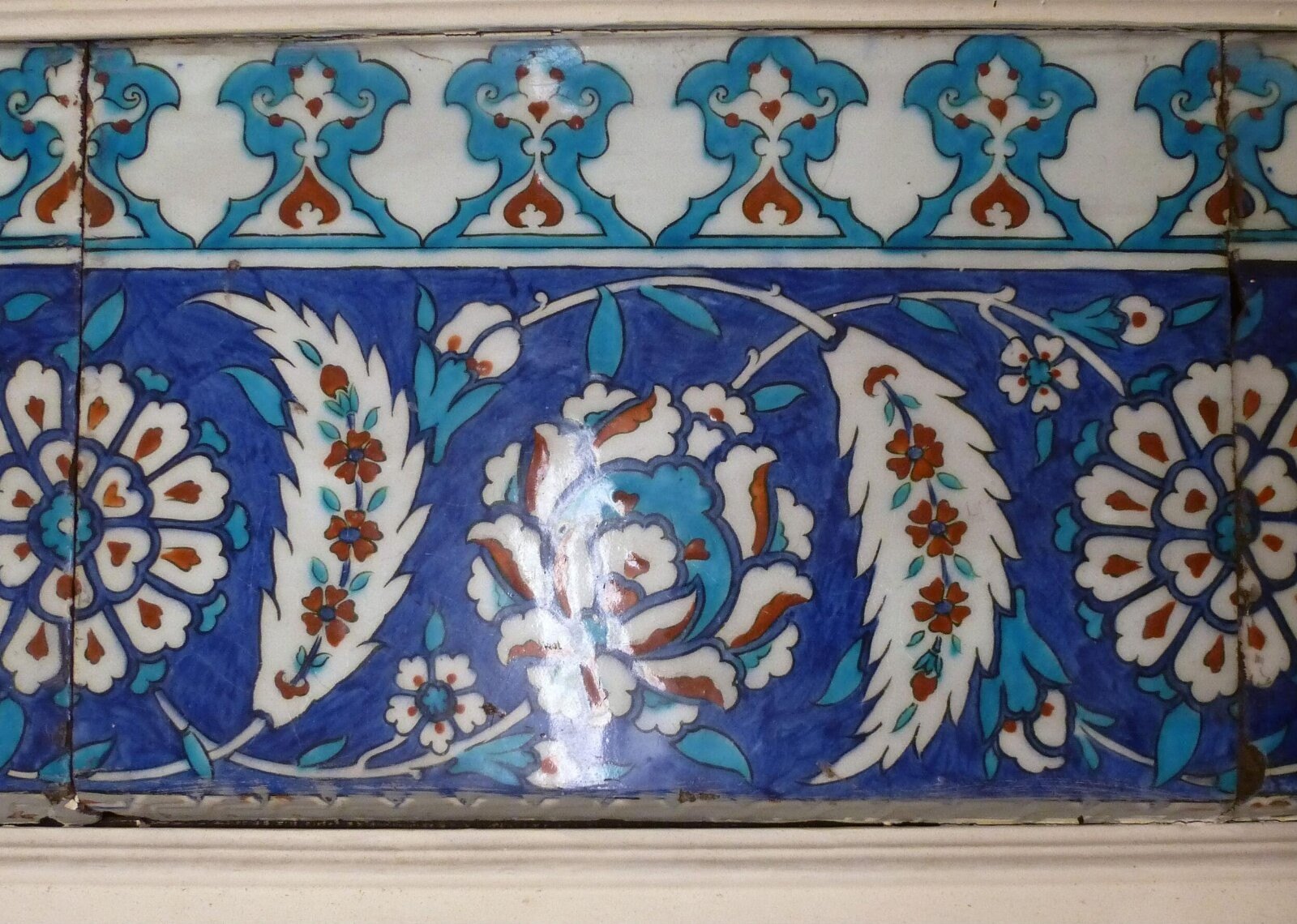 Tile panel, grey fritware, Iznik, 1550-1600 — museum object 1882:1 to 4-1897