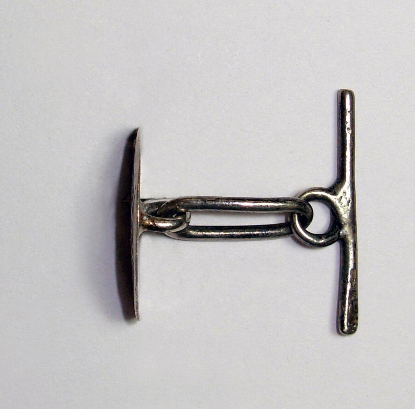 Button, silver toggle, Cordoba, 1865-1870 — museum object 1179-1871