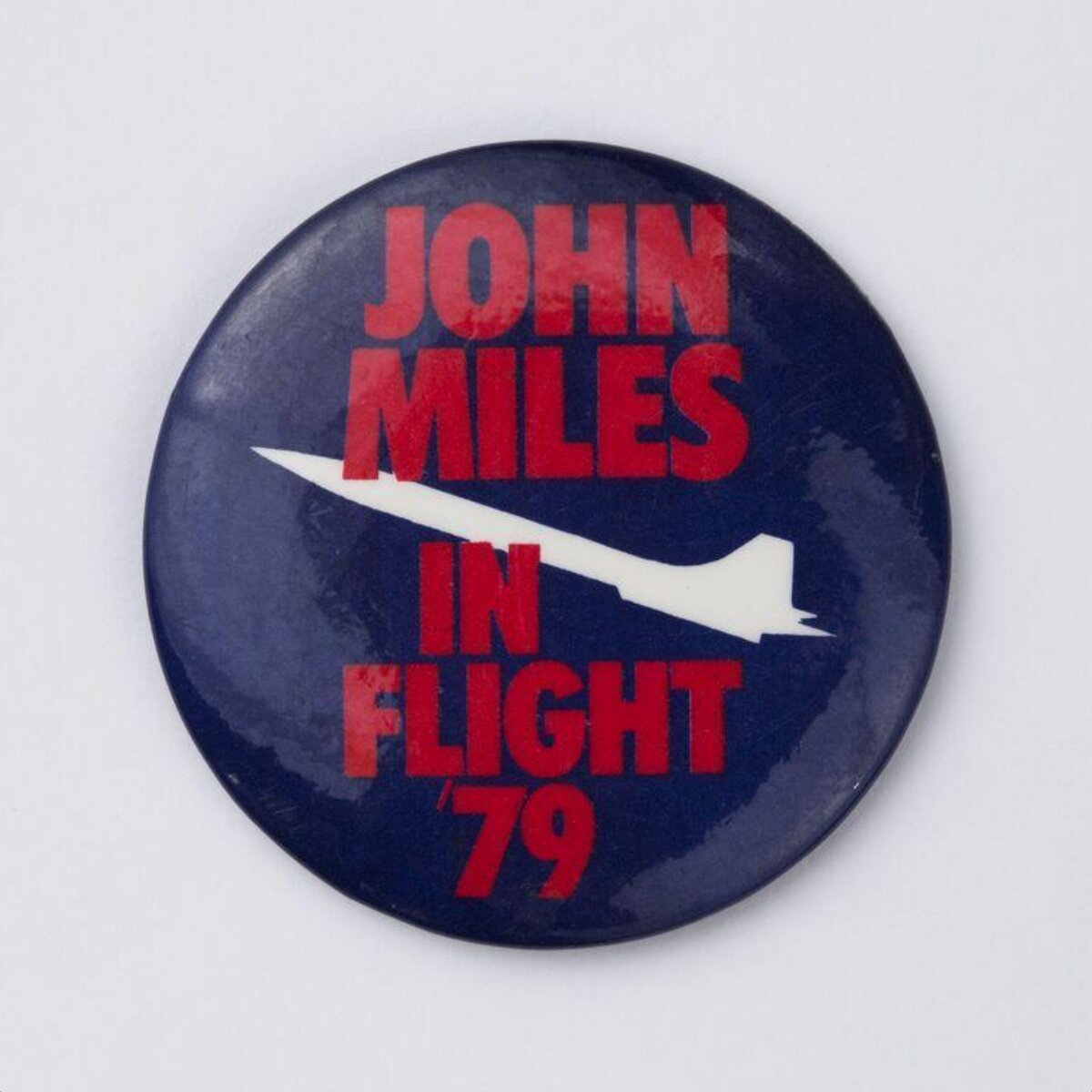 Badge — John Miles badge, 1979