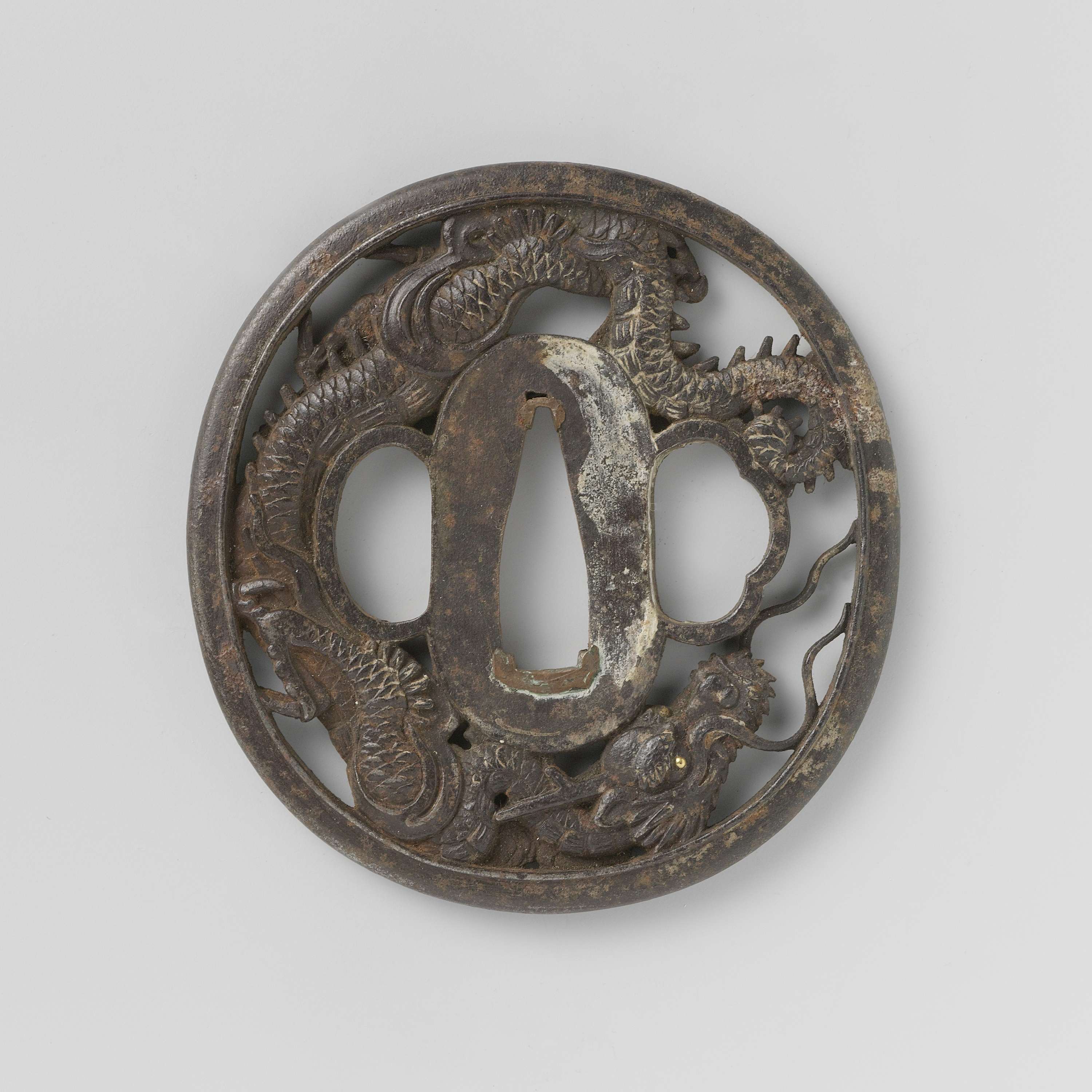 Black lacquered scabbard; openwork tsuba with dragon motif
