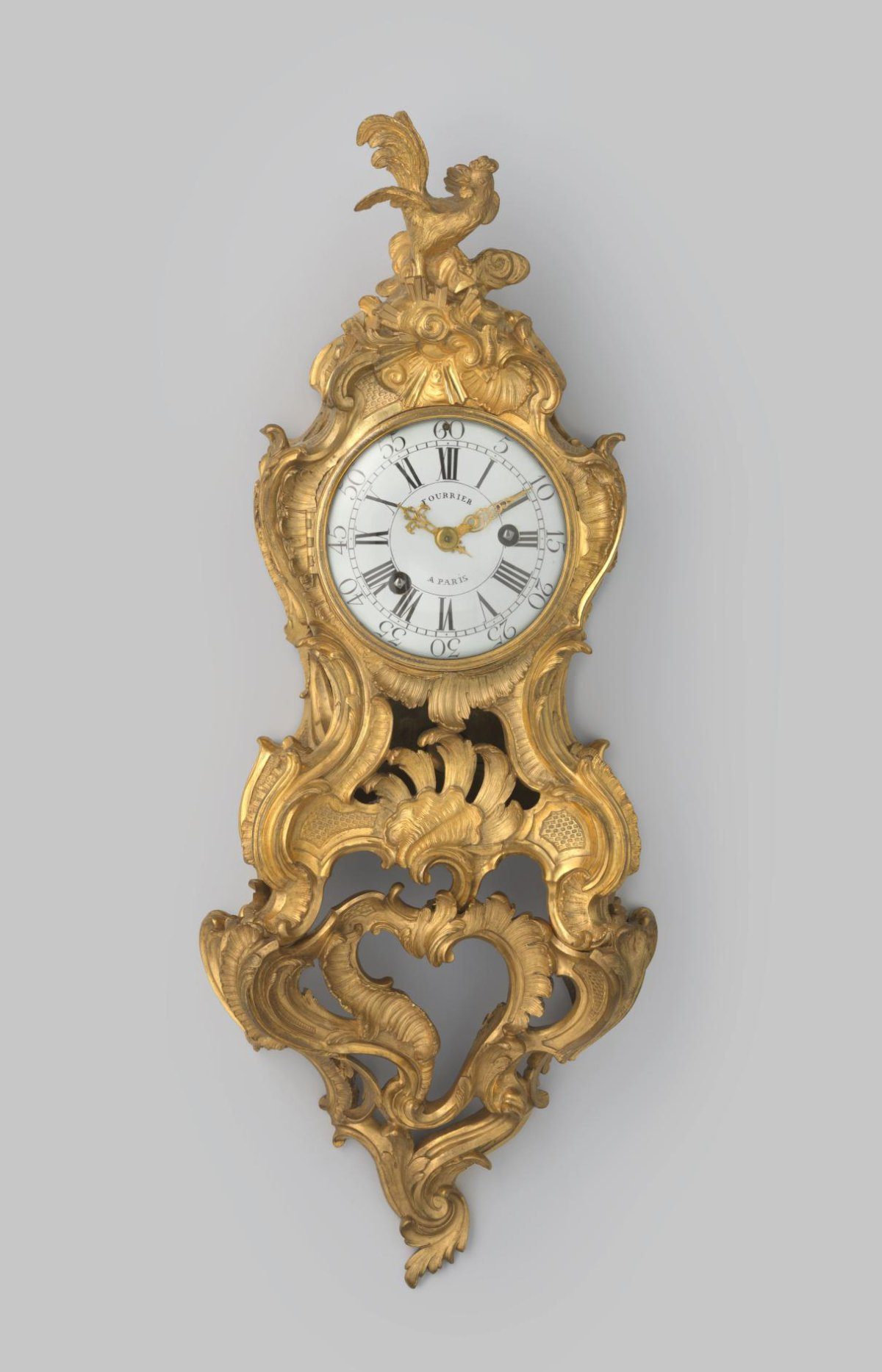 Bracket clock of gilded and chased bronze