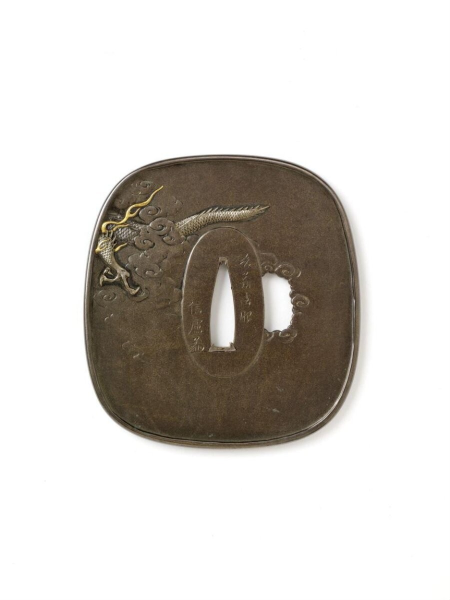 Sword guard (tsuba) depicting the Buddhist deity Benzaiten riding on a dragon