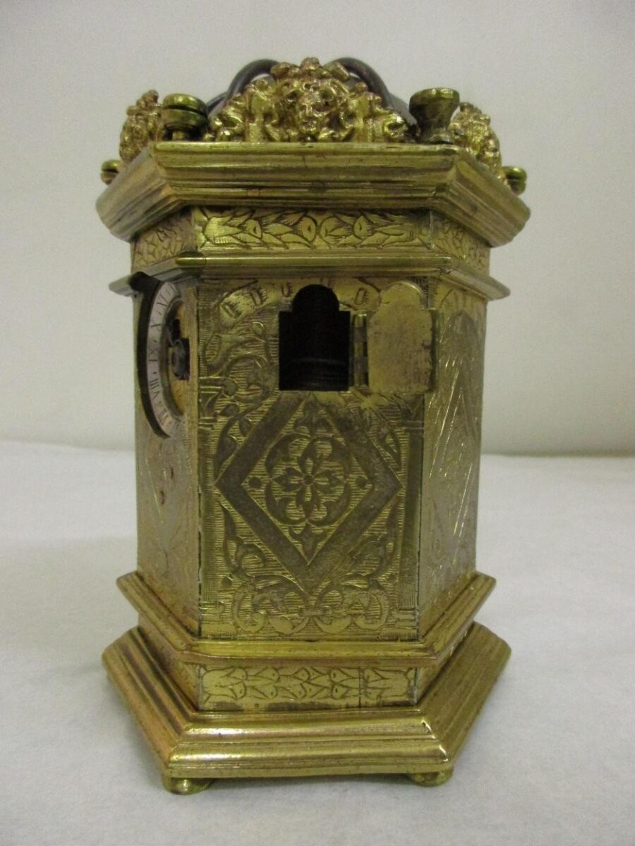 An hexagonal table clock, engraved gilt brass, French, late 16th century