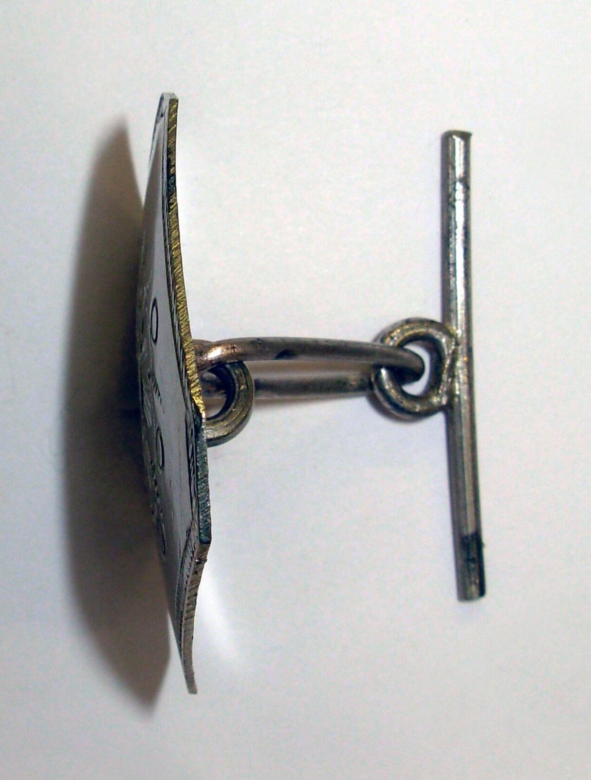 Button, engraved white metal, Salamanca, 1865-1870 — museum object 1138-1873
