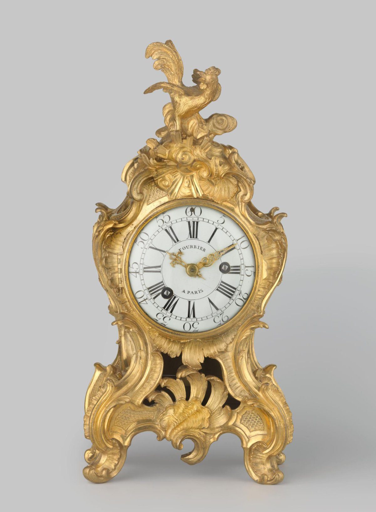Bracket clock of gilded and chased bronze