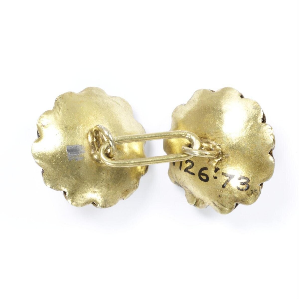 Pair of silver-gilt filigree linked buttons, Salamanca (Spain), 1850-1870.