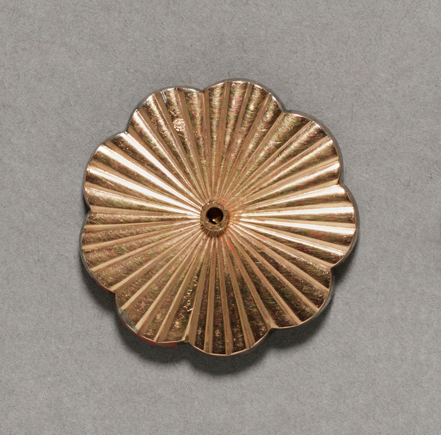Additional museum view 2 of Button (accession 1966.490.1).