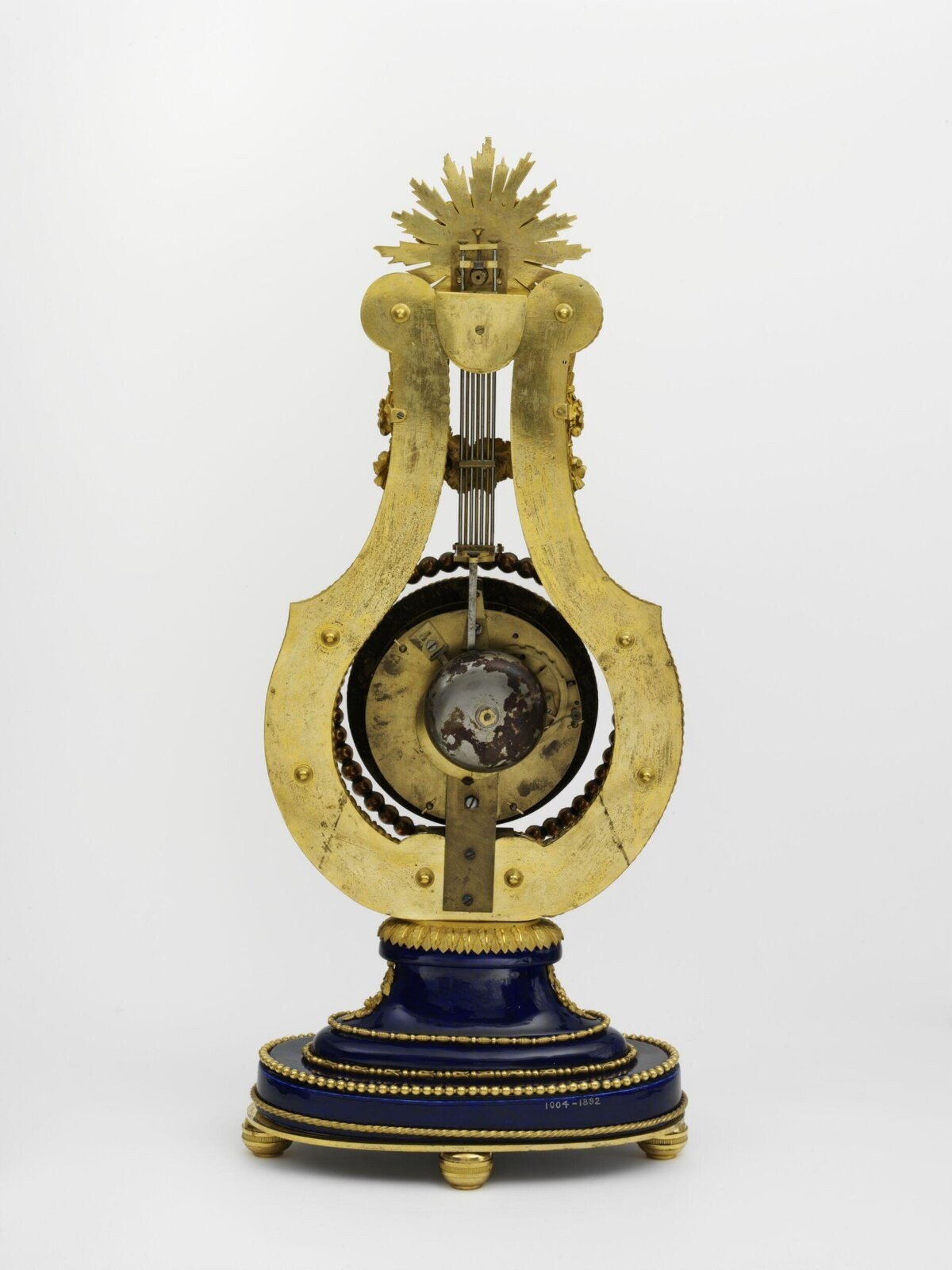 Clock, lyre-shaped, Sèvres, 1795-1797 — museum object 1004-1882