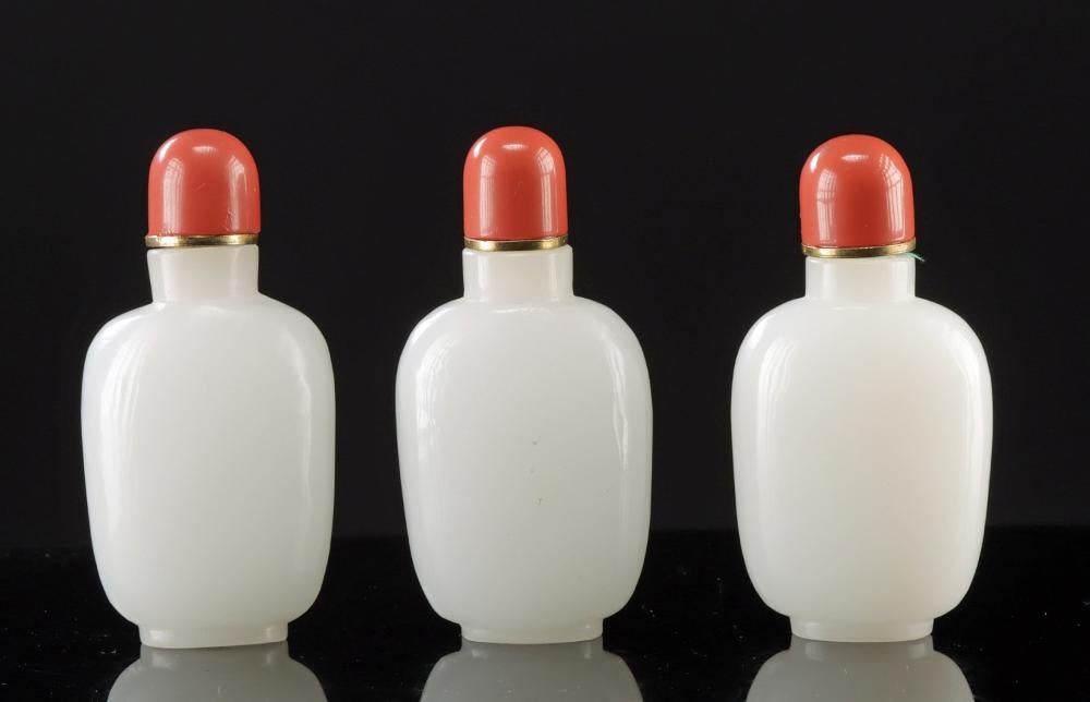 Auction-listing photograph of the example described as “Chinese White Glass Snuff Bottles, Set of 3, Coral Stoppers”.
