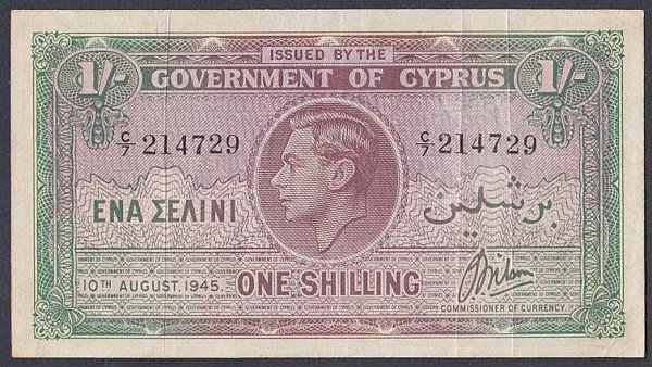 Auction photograph of an example of Pick 20 (World Banknotes: Cyprus 1 shilling KGVI dated 10th August 1945 series C/7 214729, Pick20a, VF)