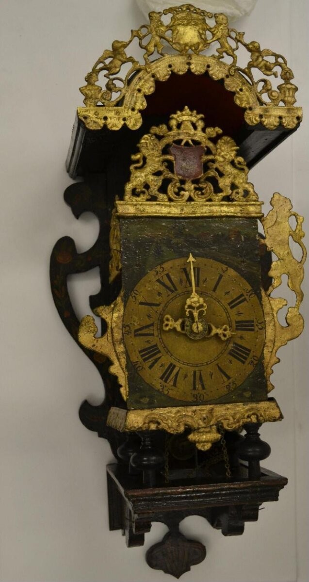 Clock, wood, iron, lead and brass with painted decoration and gilded cast ornament, Dutch, late 18th- early 19th century