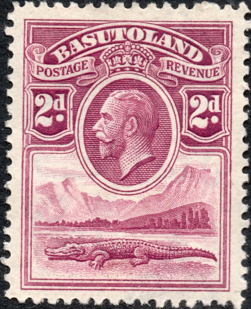Photograph of a stamp from this issue (Wikimedia Commons file “Basutoland 1933 2 British Penny Stamp Nile Crocodile (Crocodylus niloticus) and River Scene GB-BA 3.jpg”). The paper, perforation or watermark variety shown cannot be confirmed from the photograph.