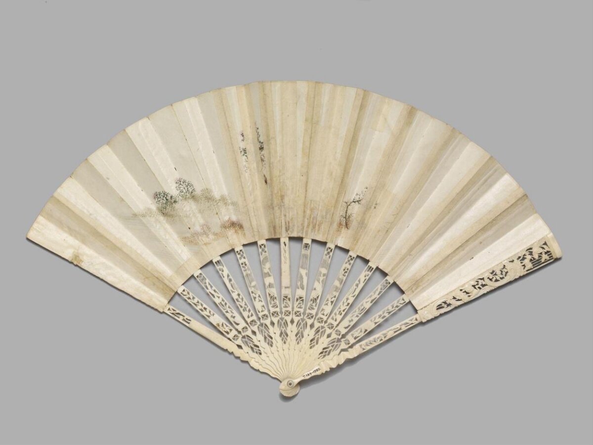 Fan, the leaf Chinese, of paper painted in watercolour with applied rice-paper, silk and straw, and ivory sticks with mother of pearl studs, France or England, 1800-1850