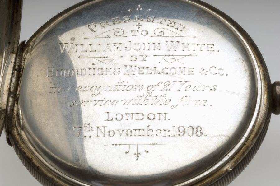 Pocket watch engraved 'Presented to William John White by BW and Co for 21 years service 7 November 1900. From Sir Henry's pocket, 12.40 am 25 July 1936 (at death) Archives & Manuscripts Keywords: Time