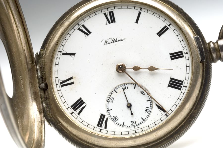 Pocket watch engraved 'Presented to William John White by BW and Co for 21 years service 7 November 1900. From Sir Henry's pocket, 12.40 am 25 July 1936 (at death) Archives & Manuscripts Keywords: Time