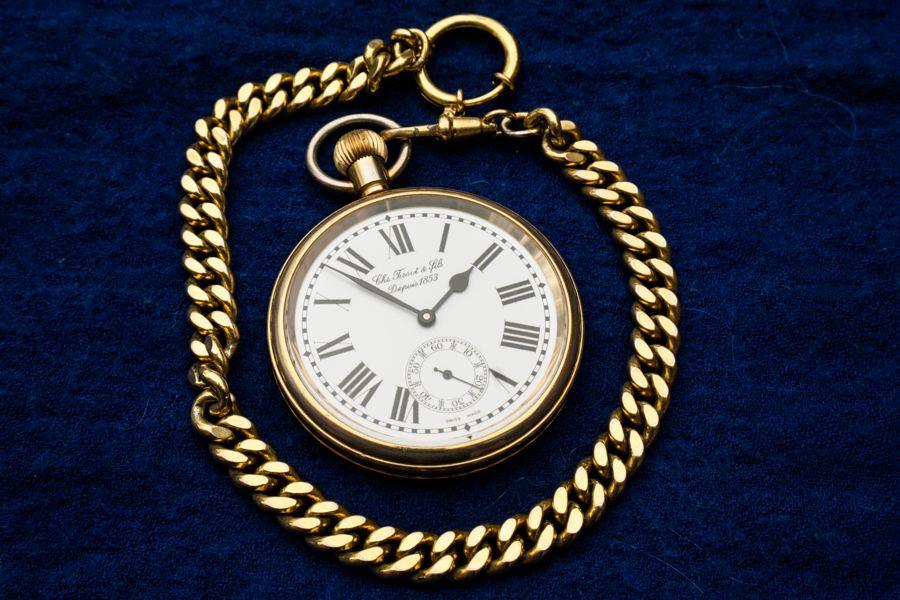 Gold pocketwatch.