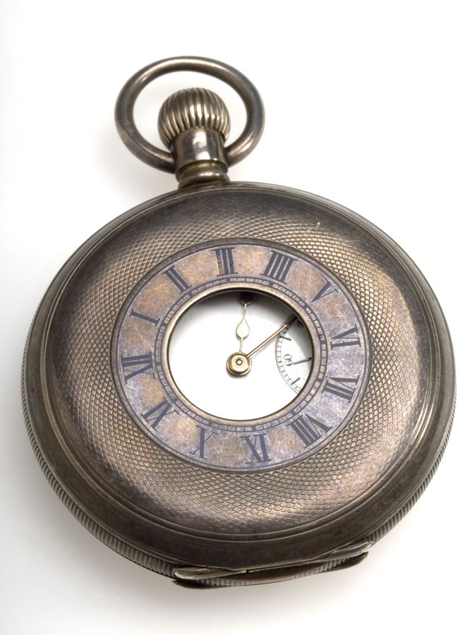 Pocket watch engraved 'Presented to William John White by BW and Co for 21 years service 7 November 1900. From Sir Henry's pocket, 12.40 am 25 July 1936 (at death) Archives & Manuscripts Keywords: Time